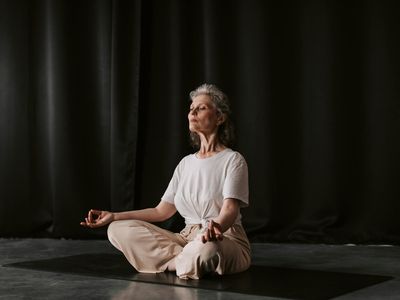Close up of hands in a meditative yoga mudra position